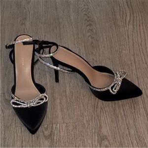 BCBGENERATION Hartense black satin heels with rhinestone bow detail